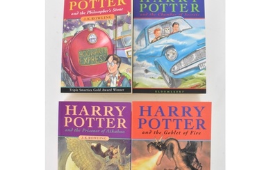 Four Harry Potter signed books, each signed by Daniel Radcli...