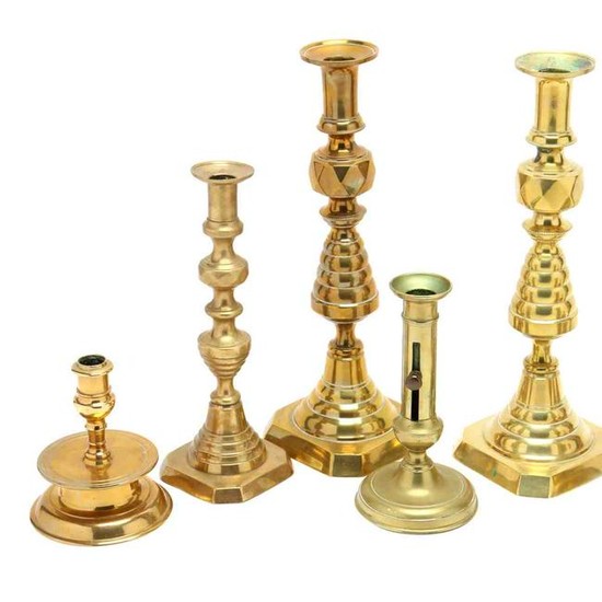 Four Pairs of Antique Brass Candlesticks