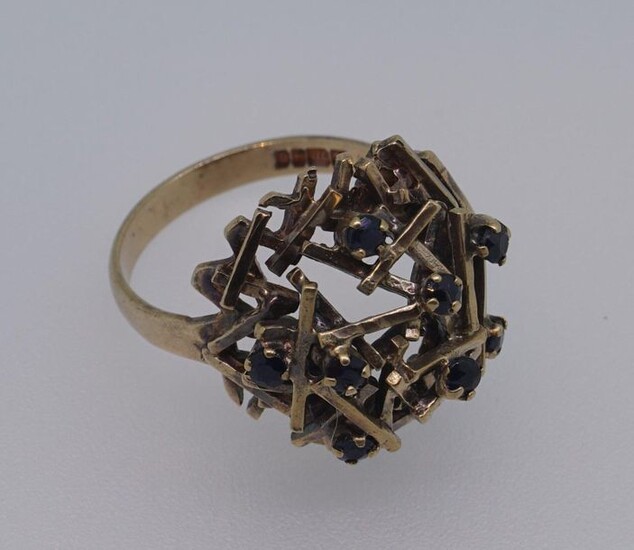 Gold English fantasy ring, London/Birmingham, 8 krt, set with 8 sapphires, appr. 6.2 grams, ring size 18 3/4