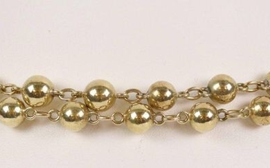Gold necklace (750) decorated with balls. Weight : 44,7 gr
