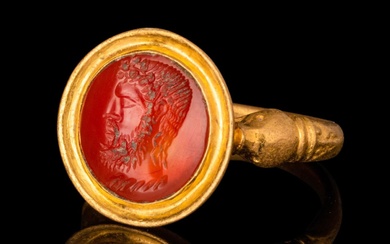 LATE HELLENISTIC GOLD FINGER RING WITH CARNELIAN INTAGLIO OF A...