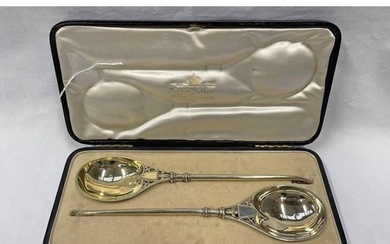 LATE VICTORIAN SILVER GILT GOTHIC STYLE SPOONS WITH SCROLL H...