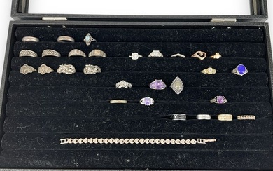 Lot of Assorted Rings and a Bracelet in a Jewelry Display Box