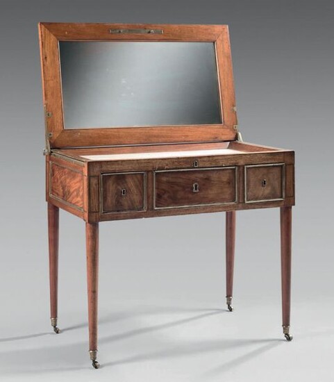 Mahogany men's hairdresser with brass moldings. Ice-bottomed tray...