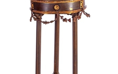 (-), Mahogany and brass guéridon richly decorated with...