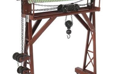 Overhead travelling crane Bing, gauge 0, model 10/68, BZ 1927-32, red-brown hand-painted with hooks, rollers and running mechanism (so-called ''trolley''), small corrugated iron roof in mint green, lattice masts on rollers as side parts, LxDxH:...