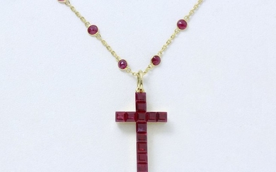 Pendant in 750 thousandths gold holding a cross...