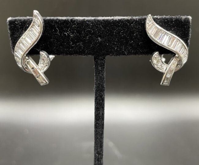 Platinum and diamond earclips, c1930