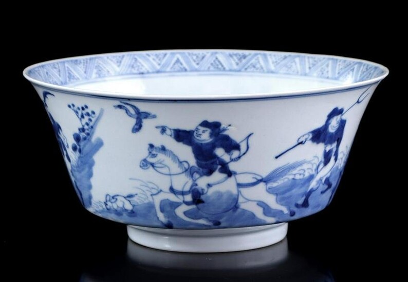 Porcelain bowl with blue and white decor of a house in
