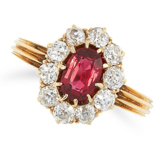 SPINEL AND DIAMOND CLUSTER RING set with an oval cut