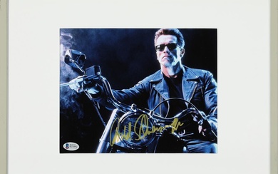 'Terminator'. A signed colour still photograph of the Austrian-American actor Arnold Schwarzenegger...