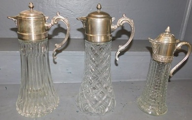 Three Silver Plate & Glass Pitchers