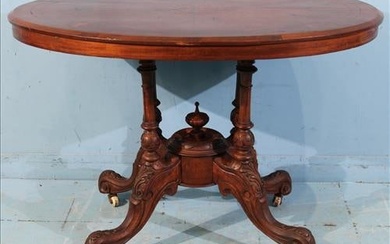 Walnut Victorian oval center table with center medallion