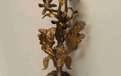 Wrought iron applique partially gilded with foliage and three flowers. 19th century. (Modern fixing plate) Height : 34 cm
