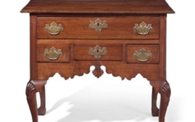 A QUEEN ANNE CARVED WALNUT DRESSING TABLE, PENNSYLVANIA, 1750-1770