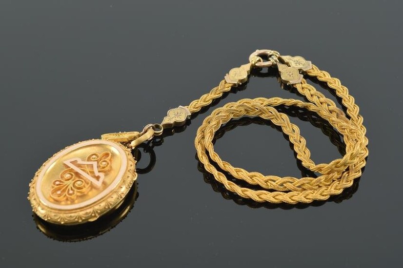 19th century Etruscan Revival 18 kt gold locket. Oval