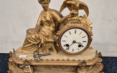 19th century French Ormolu and onyx figural mantel clock; "M...