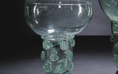 A large Dutch or German pale green-tinted glass roemer, 17th century
