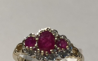 9 CT YELLOW GOLD 3 STONE RUBY AND DIAMOND CLUSTER