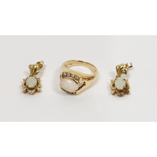 9ct gold, opal and diamond dress ring set oval opal flanked ...