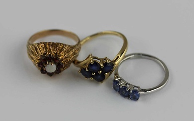 A 9ct gold and sapphire four stone ring