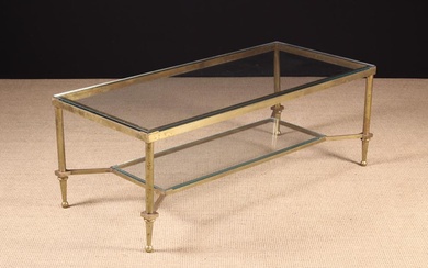 A Brass Framed Coffee Table with rectangular glass top and undershelf, 16'' (41 cm) high, 43¼'' x 19