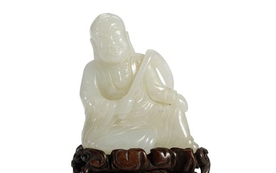 A CARVED JADE FIGURE ORNAMENTS