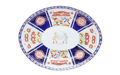 A CHINESE EXPORT ARMORIAL OVAL DISH FOR THE INDIAN MARKET 清十九世紀 約1820年 外銷粉彩繪徽章紋盤