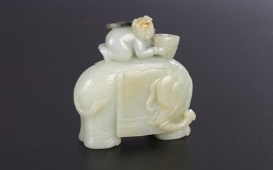 A CHINESE WHITE JADE BOY AND ELEPHANT