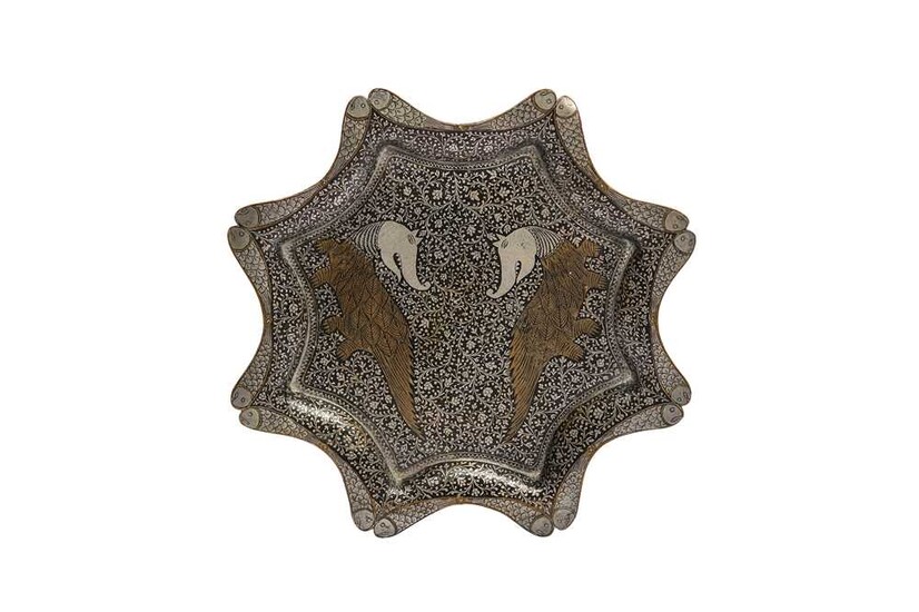 A COPPER AND SILVER-INLAID DISH India, late 19th - early 20th century