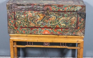 A Chinese Leather Covered Wooden Coffer of plank construction,...