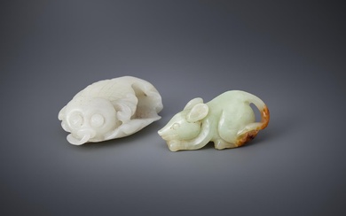 A Chinese white jade carving of goldfish