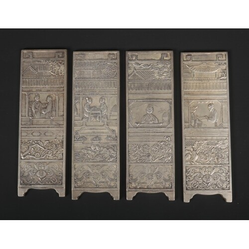 A Chinese white metal miniature four panel screen. Decorated...