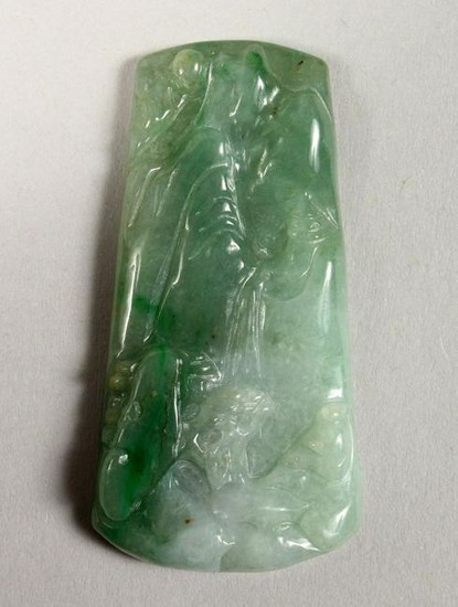 A GOOD CHINESE CARVED JADE PENDANT, carved one side to