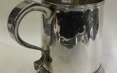 A George II silver pint mug. London 1735.