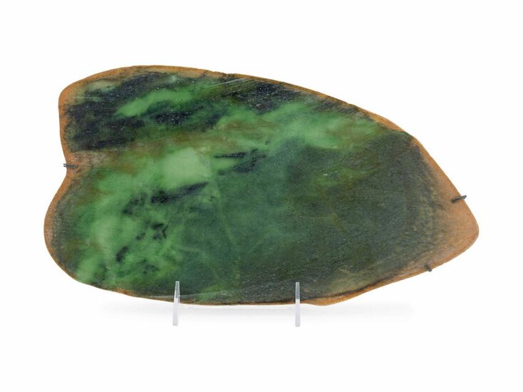 A Large Chinese Mottled Green Jade Plaque