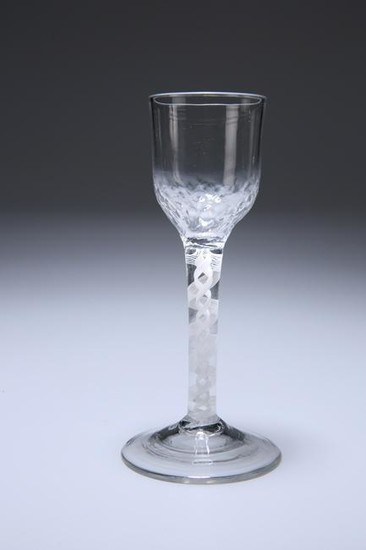 A MID-18TH CENTURY COTTON TWIST CORDIAL GLASS, with