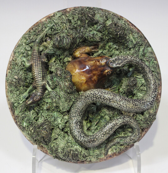 A Mafra majolica Portuguese Palissy Ware dish, late 19th century, applied with a snake, toad and liz