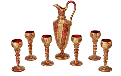 A Moser-style gilt glass decanter set