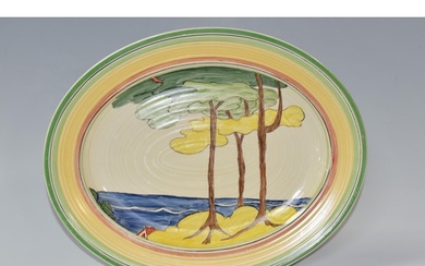 A NEWPORT POTTERY OVAL 'GREEN FIRS' PATTERN MEAT PLATE, pain...
