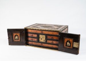 A North European 17th century elm, walnut and brass mounted table cabinet