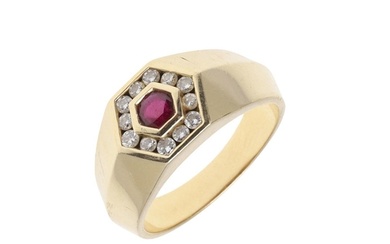 A RUBY AND DIAMOND RING. the circular-cut ruby is set within...