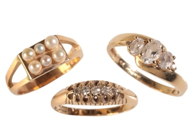A VICTORIAN 18CT GOLD DIAMOND RING claw set with a line of f...