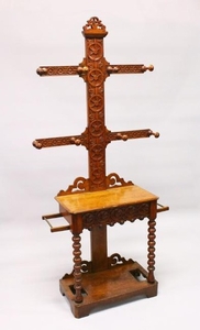 A VICTORIAN OAK HALL STAND, with carved back, single