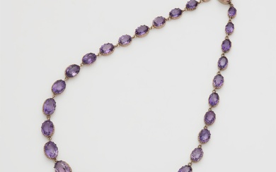 A Victorian 14k red gold and graduated amethyst necklace.