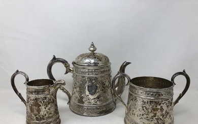 A Victorian silver three piece tea service, by Thomas Bradle...