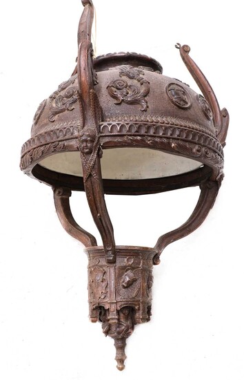 A carved wooden hanging lantern