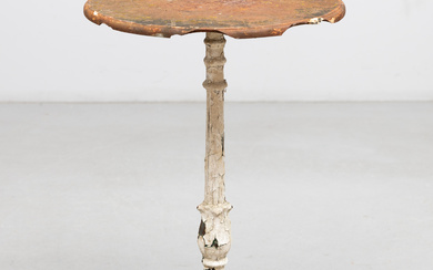 A cast-iron cafe table, early 20th century.