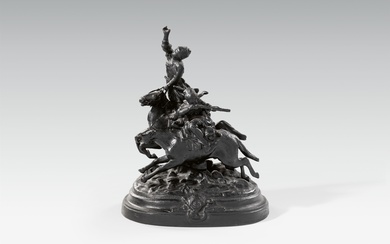 A cast iron model of two cossacks fleeing on horseback