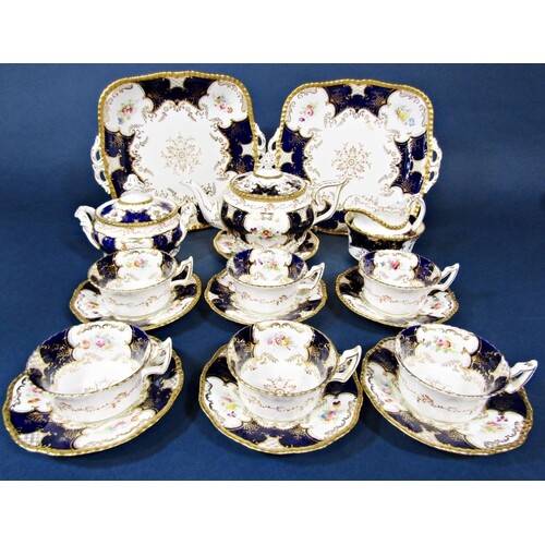 A collection of Coalport Batwing teawares in the blue colour...